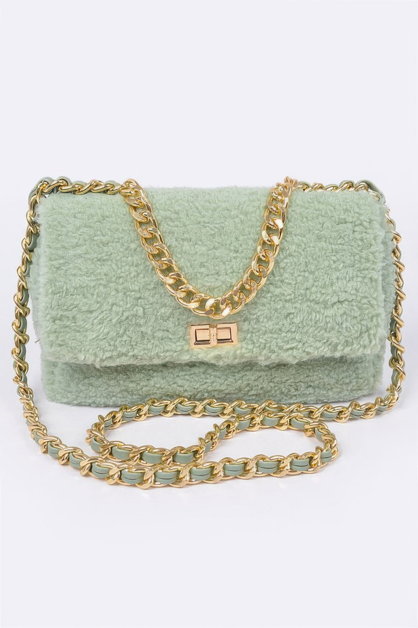 Faux Fur Shoulder Bag with gold chain strap and light green textured exterior on a white background.