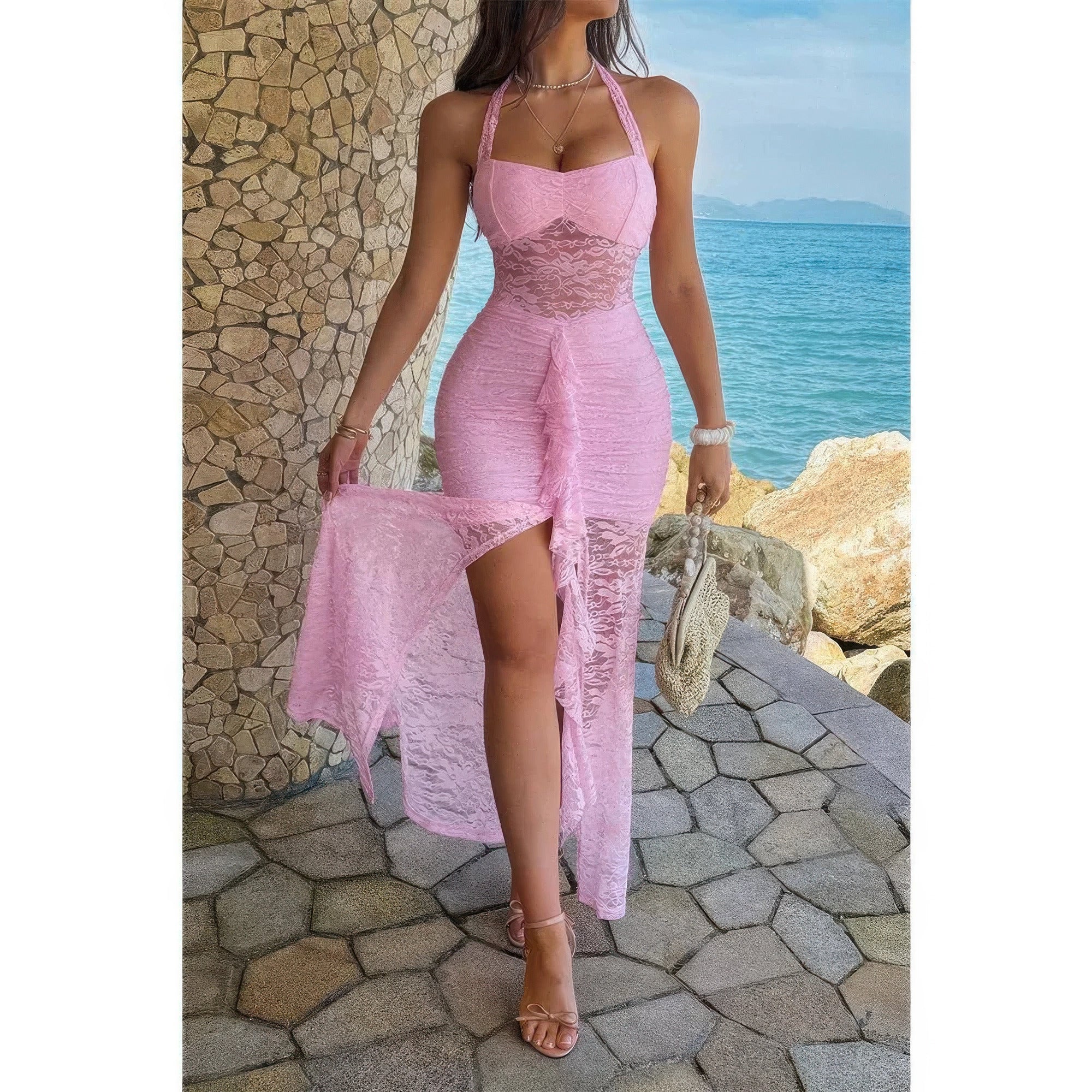 Pink lace bodycon dress with draped and ruched details, worn with nude high-heeled sandals and layered necklaces, by the